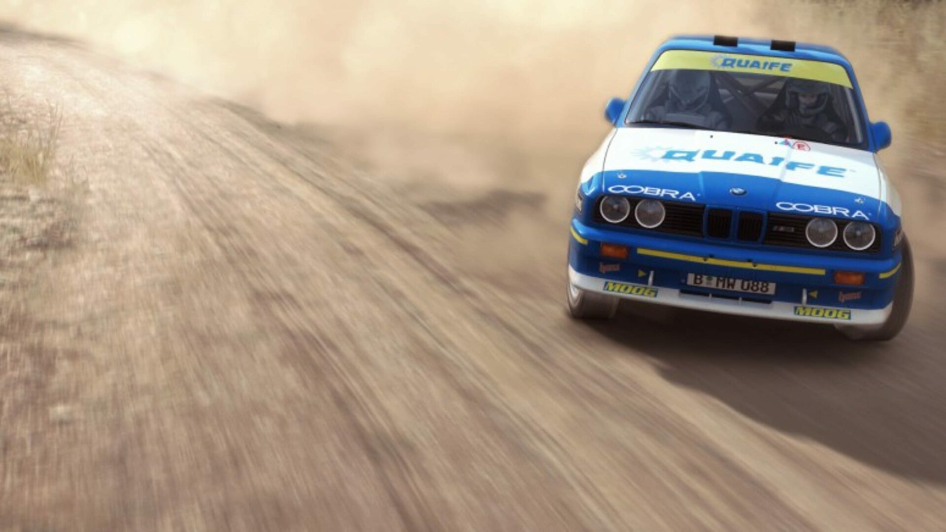 dirt rally front view of a blue and white car